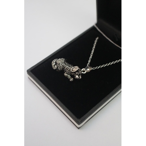 290 - Silver Articulated Dog Pendant on chain