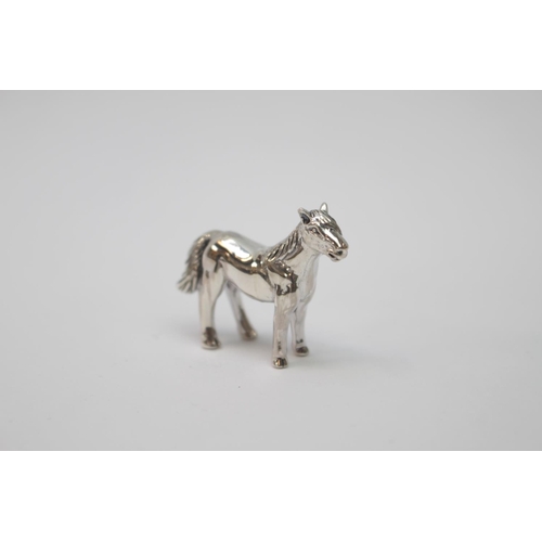 296 - Cast Silver figure of a Horse