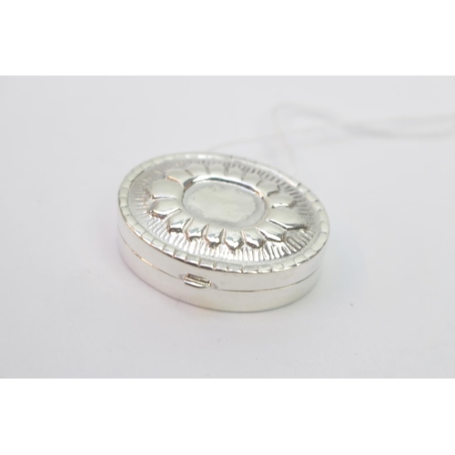 308 - Silver Pill box with embossed decoration