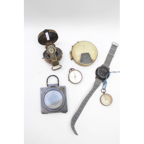 321 - Collection of Four Compasses, a Military marked clinometer and a personal dosimeter