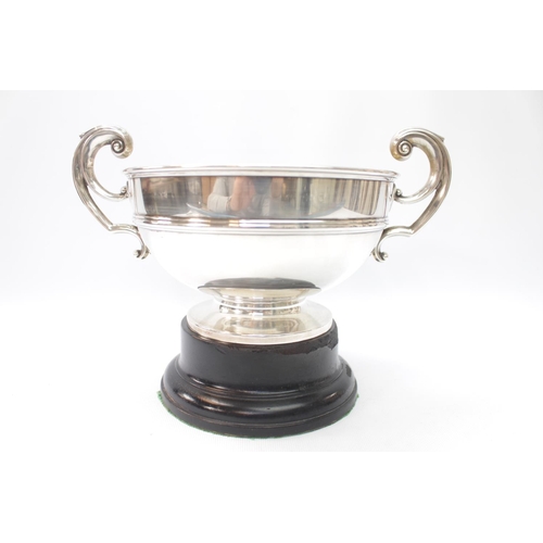 333 - Edwardian Silver two handled trophy London 1912 on wooden base 393g total weight