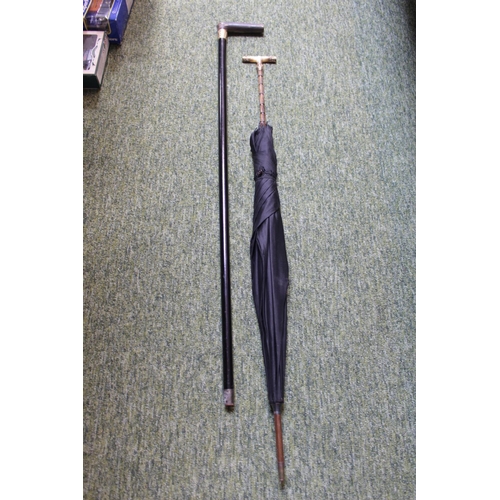 100 - Good quality Victorian 18ct Gold Plated walking stick and a Gilt Bamboo effect umbrella