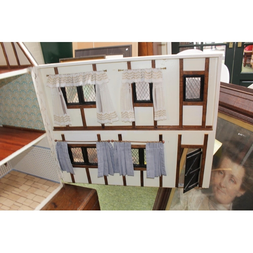 54 - Large 20thC Tudor style Dolls house