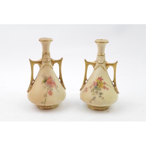 59 - Pair of Royal Worcester Blush Ivory two handled vases with floral sprig decoration pattern 1021 10cm... 