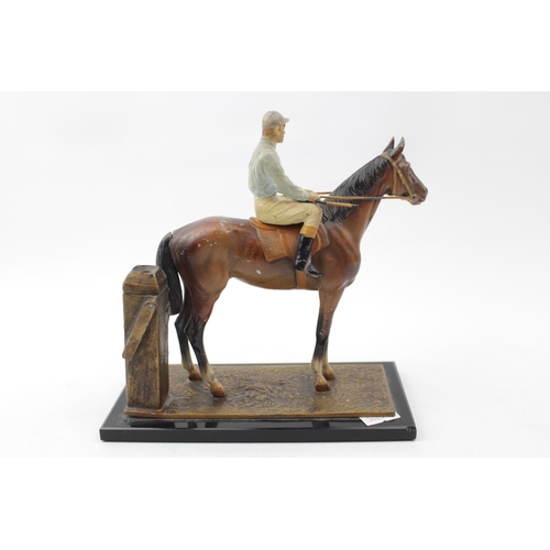 61 - Interesting Early 20thC Match Striker Cold painted figure of a Jockey on horseback set on naturalist... 