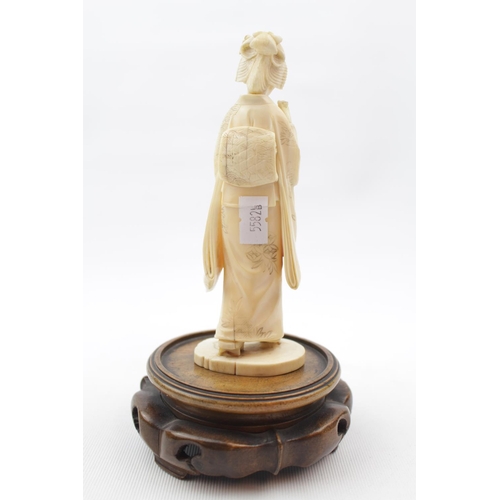 62 - Late 19thC Japanese Ivory figure of Geisha with wooden carved base, 15cm in height