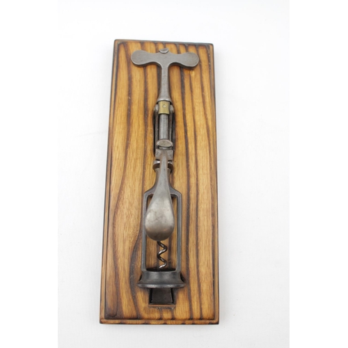 65 - Scarce Charles Hull 1864 Patent 'Royal Club' Corkscrew 22.5cm, some loss, mounted on wooden plaque