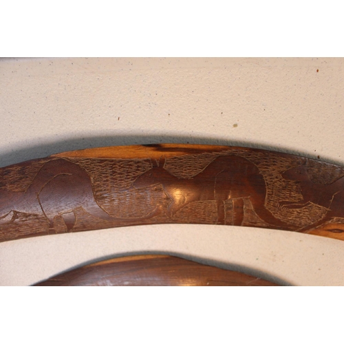 186 - Original Australian Aboriginal  Hunting Boomerang with carved animal decoration and smaller Boomeran... 