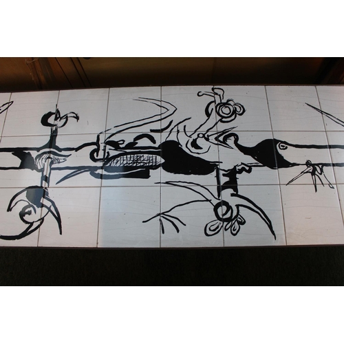 335 - A GRAHAM SUTHERLAND (1903-1980) CERAMIC TILE AND BRASS MOUNTED COFFEE TABLE
1959
The tiles decorated... 