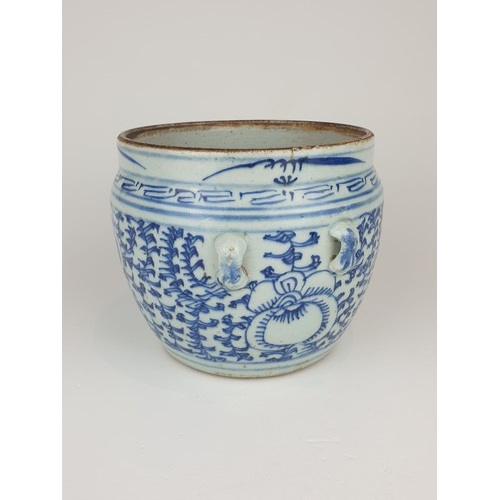 234 - 19thC Provincial blue and white porcelain jar, approx 14cm high, 16cm across