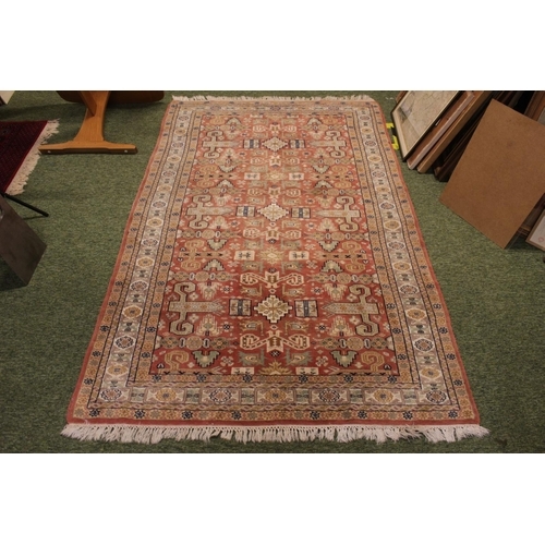 556 - Salmon and Cream 20thC Rug with knotted ends 204 x 127cm