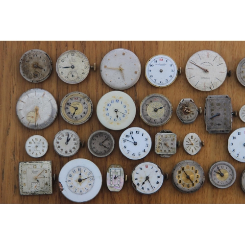 232f - Collection of 44 Watch Movements & Faces inc Janex, Exactus and Lindex. Watch movements and faces in... 