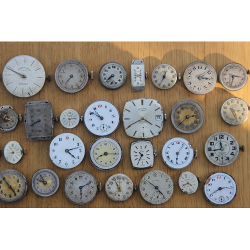 232f - Collection of 44 Watch Movements & Faces inc Janex, Exactus and Lindex. Watch movements and faces in... 