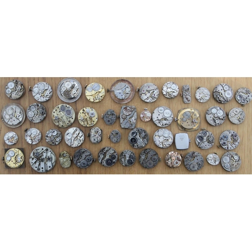 232f - Collection of 44 Watch Movements & Faces inc Janex, Exactus and Lindex. Watch movements and faces in... 