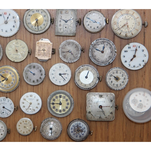 232h - Collection of 37 Watch Movements & Faces inc Trojan, Cyma & Lunesa. Watch movements inc Trojan, Accu... 