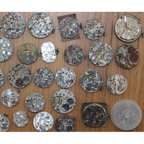 232h - Collection of 37 Watch Movements & Faces inc Trojan, Cyma & Lunesa. Watch movements inc Trojan, Accu... 