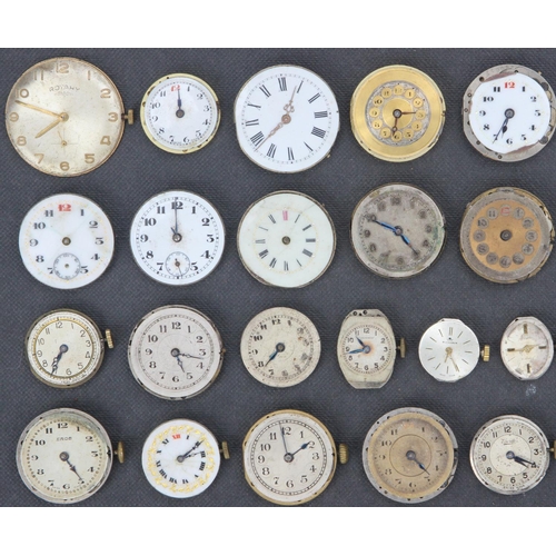 232j - Collection of 39 Watch Movements & Faces inc Trojan, Omega & Eros. Watch movements inc Trojan, Thoma... 