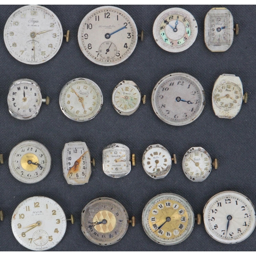 232j - Collection of 39 Watch Movements & Faces inc Trojan, Omega & Eros. Watch movements inc Trojan, Thoma... 