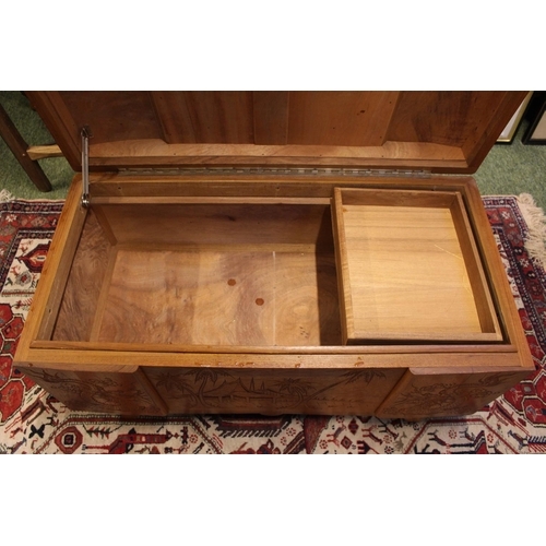 565 - Chinese Hardwood chest with carved Asian decoration