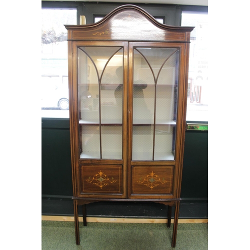 574 - Edwardian Inlaid Glazed China cabinet with arched top over glazed doors and straight legs