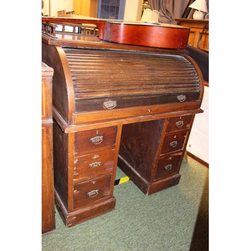 263 - Late Victorian cylinder bureau with birch fronted interior drawers and brass drop handles on pedesta... 