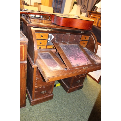 263 - Late Victorian cylinder bureau with birch fronted interior drawers and brass drop handles on pedesta... 