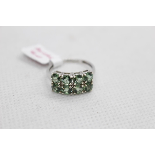 175 - 9ct White Gold Peridot Set 3g total weight Size N