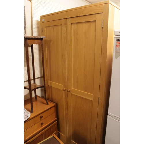 257 - Good Quality French Oak double wardrobe with rail to interior