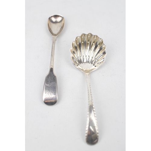 122 - Silver sugar sifter spoon, Birmingham 1933 and a Exeter mustard spoon 1844 by William Pope. 36g tota... 