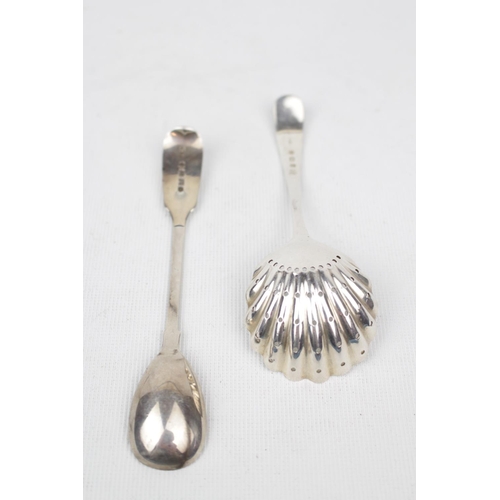 122 - Silver sugar sifter spoon, Birmingham 1933 and a Exeter mustard spoon 1844 by William Pope. 36g tota... 