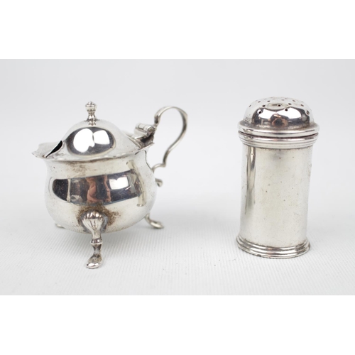 132 - Early 20thC Mustard pot on three pad feet and also a pepper 1937. 80g total weight