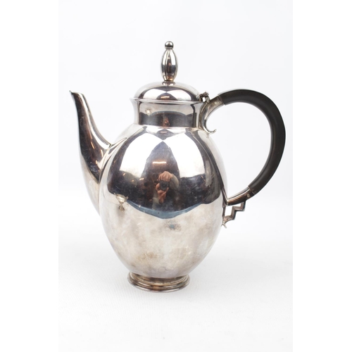 145 - A Ovoid Silver Chester silver coffee jug with hinged cover, 18cm in Height, 1938 stamped SWIN, HEREF... 