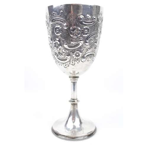 149 - An embossed Silver scroll decorated goblet on spreading base, 21.5cm in Height, Sheffield 1905 by Ma... 