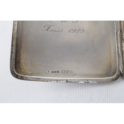 160 - A Silver engine turned cigarette case of curved outline, Chester 1928 by T Nightingale & Son. 85g to... 