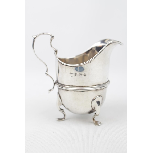 170 - Silver George I style jug on three scroll feet, 10cm in Height, Birmingham 1906 110g total weight