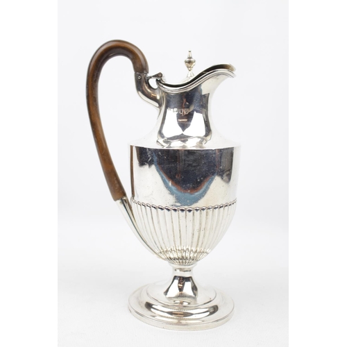 174 - A Victorian half-fluted water jug with an urn finial to hinged cover, 21cm in Height London 1893.  3... 