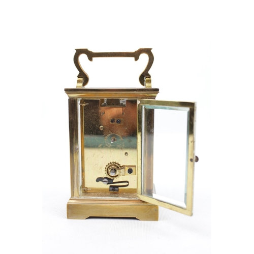 200 - Good Quality 20thC Brass Cased carriage clock with Roman numeral dial with double ended key 15cm in ... 