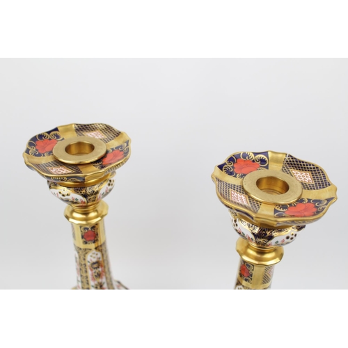 214 - Pair of Royal Crown Derby 1128 pattern Castleton candlestick XXXIX, Out swept square base, 26.5cm to... 