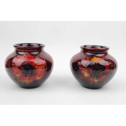 232 - Pair of Moorcroft Peony Flambe Squat vases 7cm in Height with impressed mark and signature to base