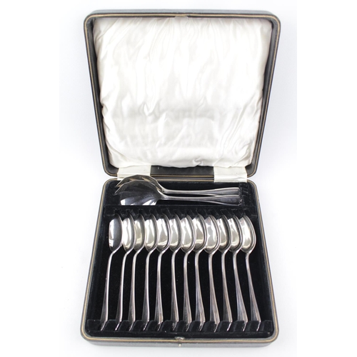 63 - Heavy quality Cased set of 12 Silver Spoons and Serving spoons by Cooper Brothers & Sons Ltd, Sheffi... 