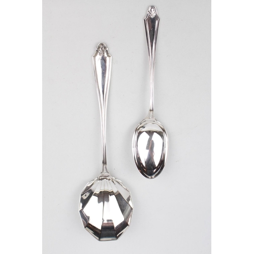 63 - Heavy quality Cased set of 12 Silver Spoons and Serving spoons by Cooper Brothers & Sons Ltd, Sheffi... 