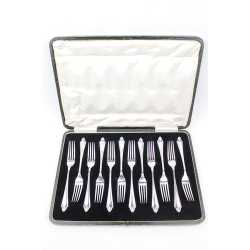 64 - Cased Set of 12 Silver Forks with shell motif handles by Cooper Brothers & Sons, Sheffield 1926. 492... 