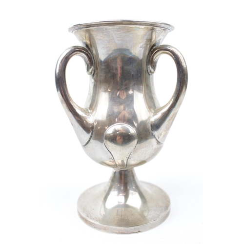 65 - Art Nouveau Silver Pedestal Trophy cup with three handles by Norton White, Birmingham 1921, 19cm in ... 