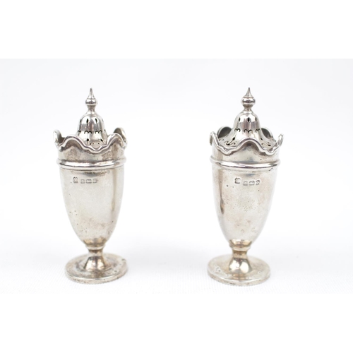 69 - Pair of Silver Pepperettes with wavy edge rims. by Martin Hall & Co Ltd. 86g total weight