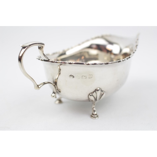 95 - George V Silver Sauce Boat with piecrust rim and stepped pad feet by Adie Brothers Ltd, Birmingham 1... 