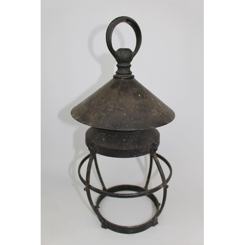 204b - Edwardian Bronze hanging storm lamp of bombe form and studded detail, 45cm in Height