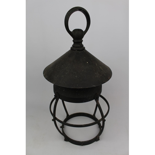 204b - Edwardian Bronze hanging storm lamp of bombe form and studded detail, 45cm in Height