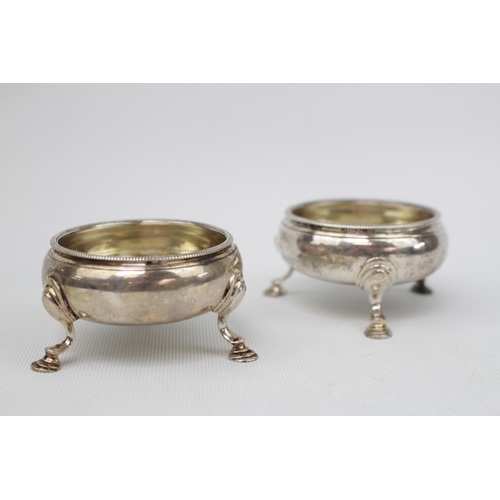 197 - Pair of Silver George III Silver salts each on pad feet with beaded rims. 7cm in Diameter. London 17... 