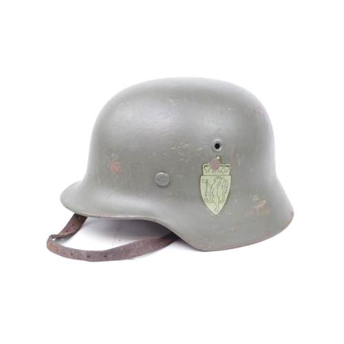 135 - Norwegian WWII M35 German Helmet marked 66 to interior