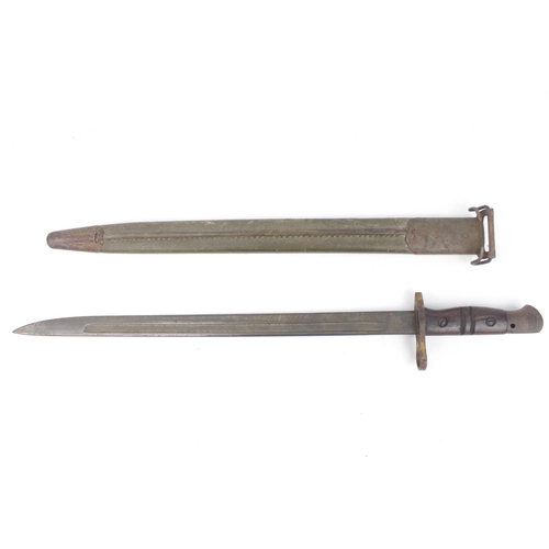 141 - Remington made Model 1918 bayonet as fitted to the US Model 1917 rifle with scabbard. 56cm in Length